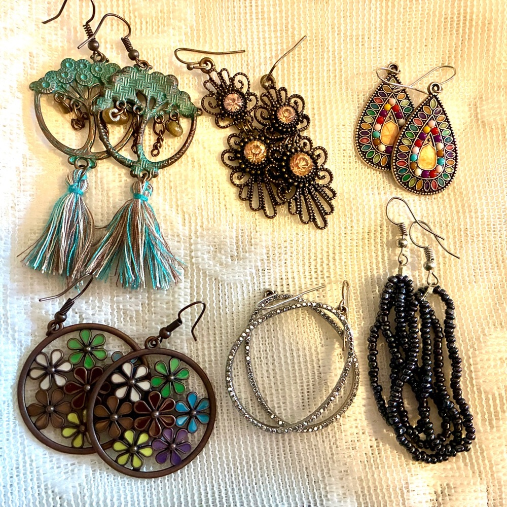 20 pairs of long dangly earrings.Scroll through all 20 pairs of a color variety